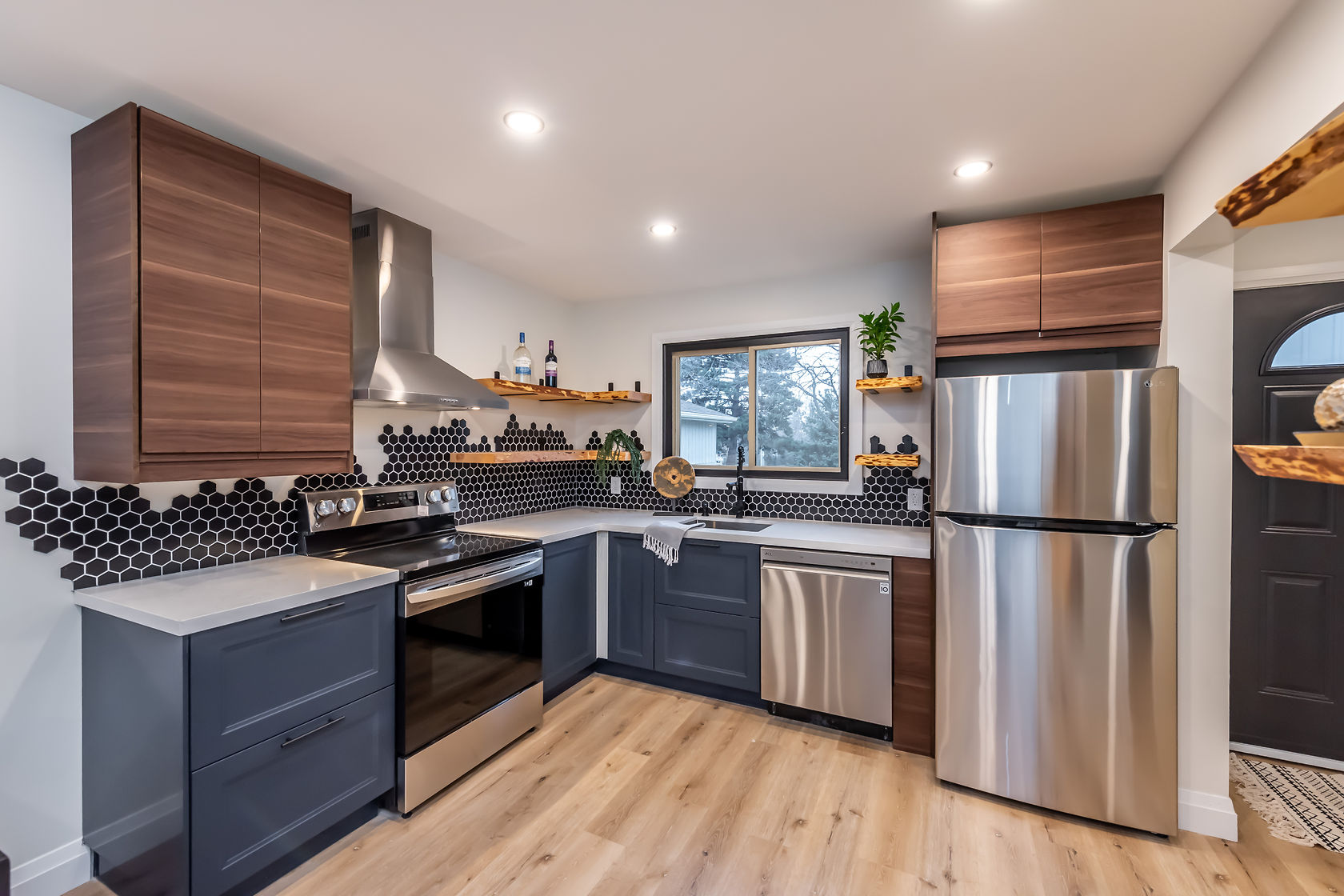 Premium finished kitchen with striking material contrast and professional staging — Gateshead, Hamilton | MTC Renovations